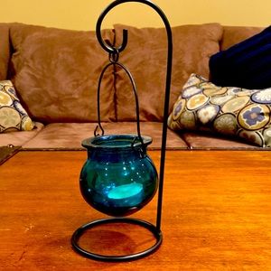 NWOT candle suspended on a hook
